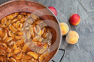 Homemade marmalade or jam processing from apricotes or peaches