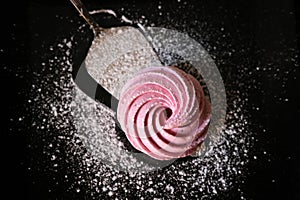 Homemade marshmallow on a dark background.