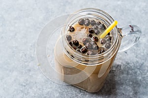 Homemade Milk Bubble Tea with Tapioca Pearls in Mason Jar.