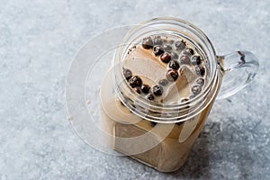 Homemade Milk Bubble Tea with Tapioca Pearls in Mason Jar.