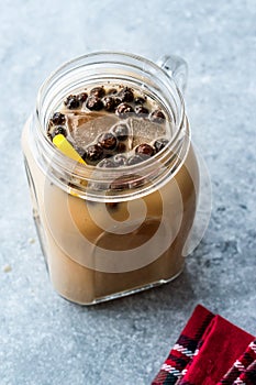 Homemade Milk Bubble Tea with Tapioca Pearls in Mason Jar.