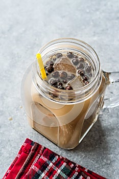Homemade Milk Bubble Tea with Tapioca Pearls in Mason Jar.