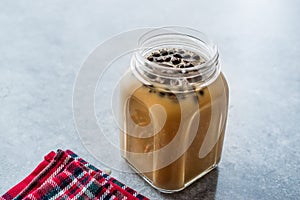 Homemade Milk Bubble Tea with Tapioca Pearls in Mason Jar.