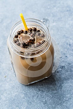 Homemade Milk Bubble Tea with Tapioca Pearls in Mason Jar.