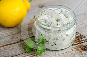 Homemade mint exfoliating scrub scalp peeling, bath salt, foot soak with sugar, chopped mint leaves