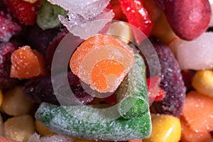 Homemade mixture of frozen vegetables, macro close-up background