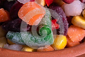 Homemade mixture of frozen vegetables, macro close-up background