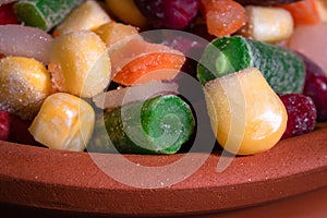 Homemade mixture of frozen vegetables, macro close-up background