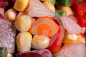 Homemade mixture of frozen vegetables, macro close-up background