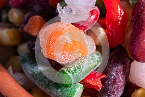 Homemade mixture of frozen vegetables, macro close-up background