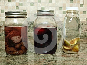 Homemade moonshine - jars photo