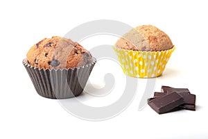 Homemade muffin with raisins and chocolate cupcake. selective focus