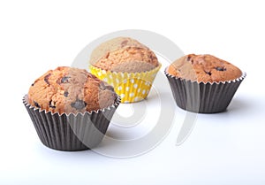 Homemade muffin with raisins and chocolate cupcake. selective focus