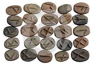 Homemade mystical magic rune signs made of clay isolated