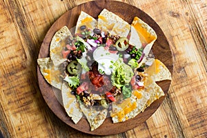 Homemade Nachos with tortilla chips cheese and guacamole