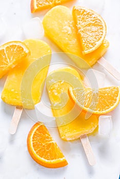 Homemade, natural orange ,refreshing summer popsicle