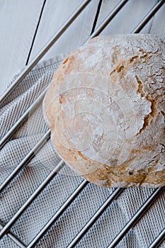 Homemade no knead bread over a cooling rack