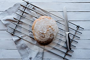 Homemade no knead bread over a cooling rack