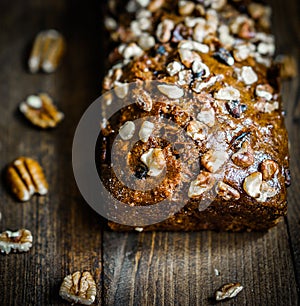 Homemade nut cake on wooden background