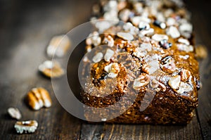 Homemade nut cake on wooden background