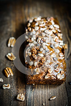 Homemade nut cake on wooden background