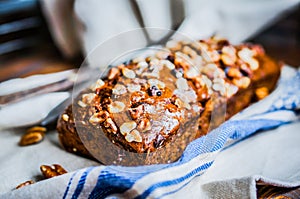 Homemade nut cake on wooden background