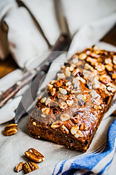 Homemade nut cake on wooden background