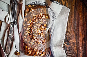 Homemade nut cake on wooden background