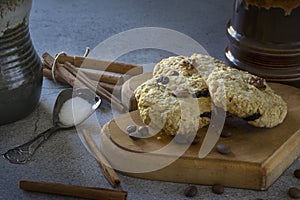 Homemade oatmeal raisin cookies with coffee beans and cinnamon sticks