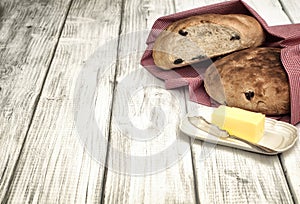 Homemade Old World Bread with Olives on White Board Tableop as Background with room or space for text, words, copy. Grunge effect