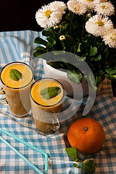 Homemade orange banana juice still life