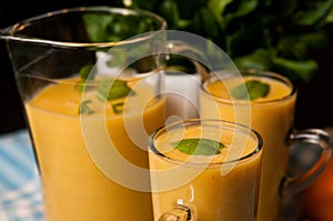 Homemade orange banana juice still life