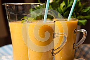 Homemade orange banana juice still life