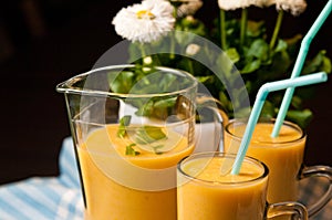 Homemade orange banana juice still life