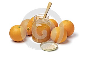 Homemade orange marmelade in glass jar photo