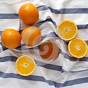 Homemade orange marmelade in glass jar, view from above. Flat lay, top view, overhead