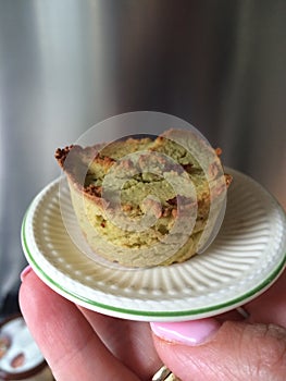 Homemade paleo avocado bread mini cupcake on wedgwood petit four plate