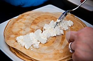 Homemade pancakes with white cheese