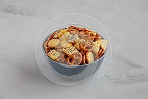 Homemade Party Snack Mix with Crackers and Pretzels in a Bowl, side view