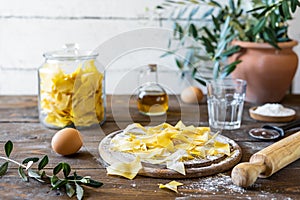 Homemade pasta Maltagliati with ingredients in rustic style