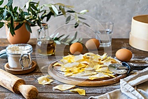 Homemade pasta Maltagliati with ingredients in rustic style