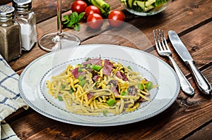 Homemade pasta with roasted Black Forest ham