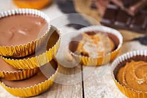 Homemade peanut butter cups on a rustic table