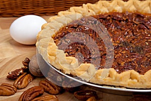 Homemade pecan pie with ingredients