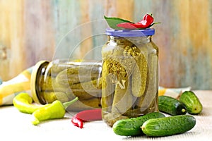 Homemade pickles in jar. Preserving pickled cucumbers.