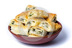 Homemade pie with cheese and spinach isolated