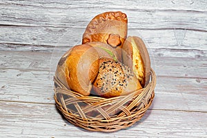 Homemade pies with filling in a basket