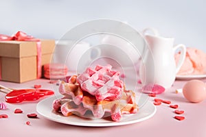 Homemade pink waffles with whipped cream. Valentine\'s day, Mother day concept. Tasty breakfast
