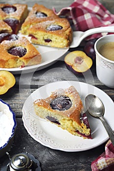 Homemade plum pie and cup of coffee. New York Times recipe plum cake