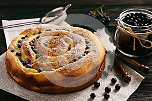 Homemade poppy seed cake with aronia berries.